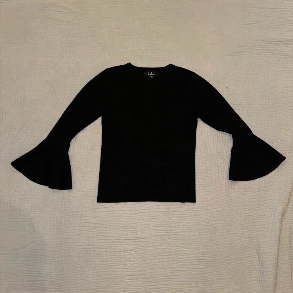 Peplum Sleeve black top size medium